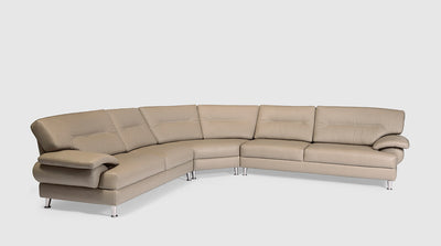 An Italian inspired, cream, leather corner sofa with silver steel legs, a double needle, saddle stitch and wide arms.