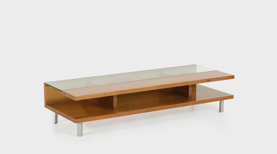 A modern contemporary coffee table with a walnut frame, glass top and aluminum legs. 