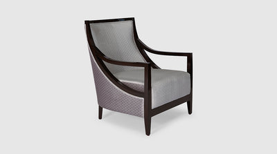 A luxurious, art deco design with a plush upholstered seat, curved, high back and mahogany frame.