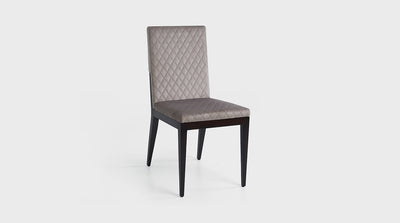 A contemporary piece, with a minimal linear design. Upholstered in a neutral, quilted, velvet. It has a simple yet interesting mid back dark mahogany timber frame and diagonal back legs.