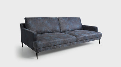 A contemporary sofa with a retro twist. Fully upholstered in a blue grey fabric. It also features slim arms and black steel legs.