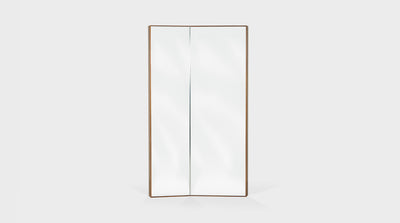 An angled, rectangular mirror