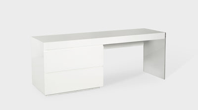 A contemporary desk with a perspex leg and a timber top with two drawers.