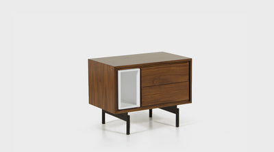 A mid-century style pedestal with two timber drawers, a white timber cubby and black, powder coated, steel legs. 