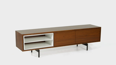A mid-century style TV unit with a walnut timber cupboard and drawers. It has white timber shelves and black, powder coated, steel legs.
